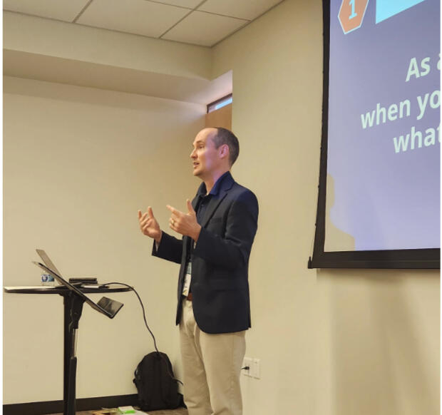 Kyle leads a workshop at a missions conference.